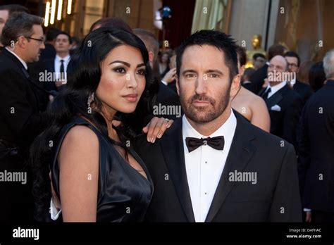 US musician Trent Reznor and his wife Mariqueen Maandig arrive for the 83rd Academy Awards, the ...