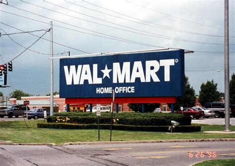 Walmart Bentonville Home Office sign with a vintage 1990s company logo (1995)