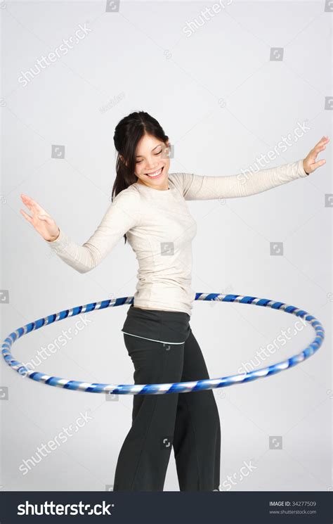 Happy Girl Doing Hula Hoop Stock Photo 34277509 : Shutterstock