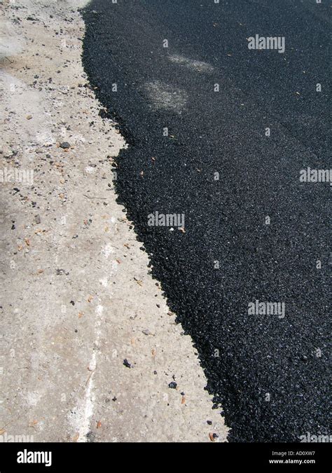 fresh tarmac on road Stock Photo - Alamy