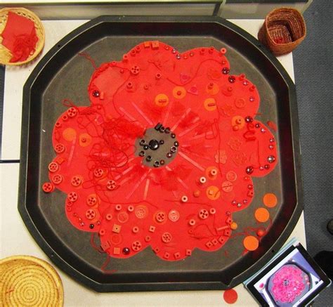 Lovely transient art idea from Sacks-n-stories. Poppy cut from paper ...