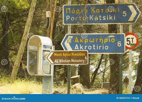 Greek Road Signs And Telephone Booth Editorial Image | CartoonDealer.com #46025724