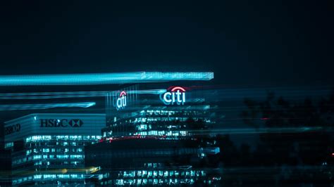 City buildings with lights during night time photo – Free Citibank Image on Unsplash