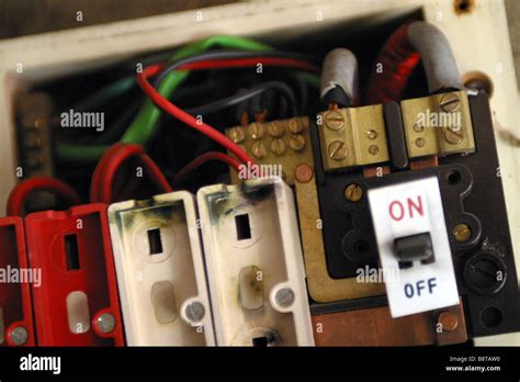 consumer unit box electrical fuse box old wire fuse type in a 1970's house Stock Photo - Alamy