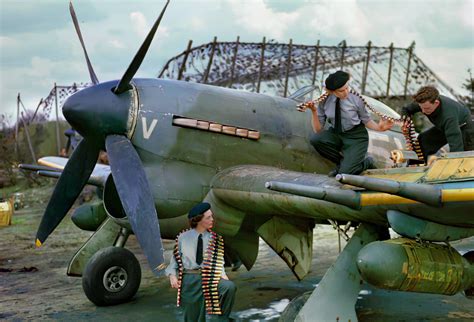 A posed photo of a Hawker Typhoon Mark IB of No. 439 Squadron RCAF at B78/Eindhoven, Holland ...