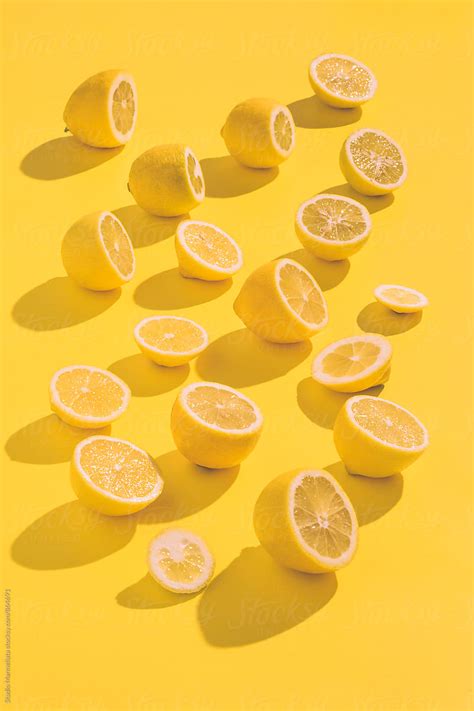 "Yellow Lemons On A Yellow Background" by Stocksy Contributor "Studio Marmellata" - Stocksy