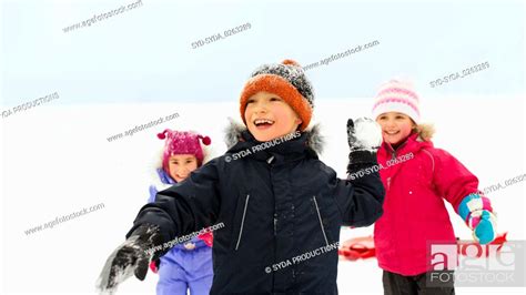 happy little kids playing outdoors in winter, Stock Photo, Picture And ...