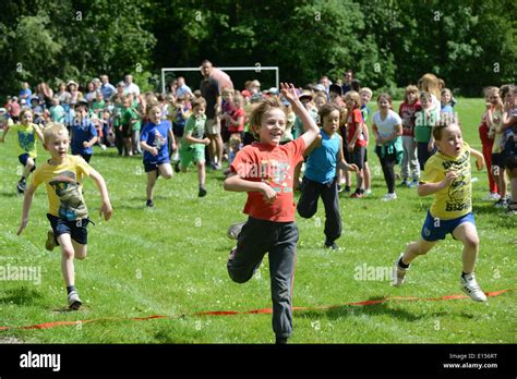 Primary School sports day boys running race Uk Stock Photo - Alamy