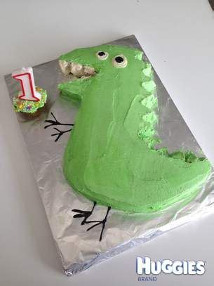 George Pig's Dinosaur | Peppa pig birthday cake, Dinosaur birthday cakes, Pig birthday cakes