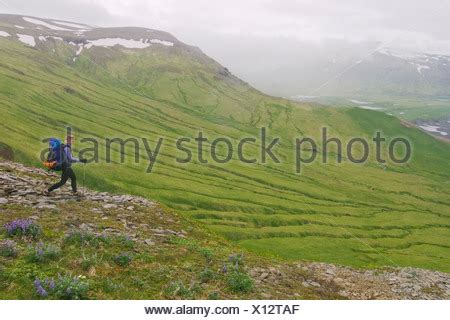 A woman hiking on Umnak Island in the Aleutian Islands, Alaska Stock Photo: 31327700 - Alamy