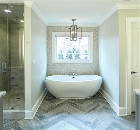 Master-Bath-Herringbone-floor-tile-pebble-backsplash-Large-tub | Greenbrook Design Center