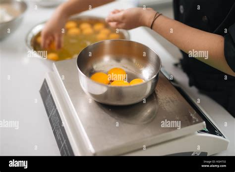 Bakery chef cooking bake in the kitchen professional Stock Photo - Alamy