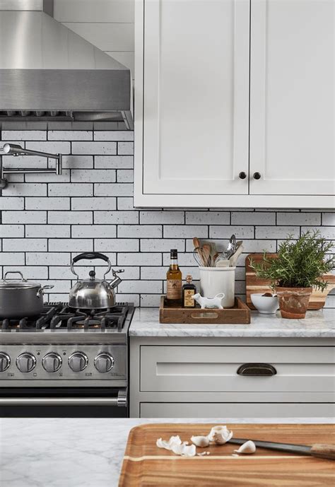 Jan Jones | White tile kitchen backsplash, Kitchen grout color, White kitchen backsplash