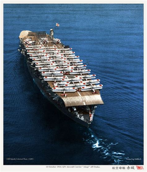 The IJN Carrier "Akagi", with a full compliment of early biplanes, at sea on October 15th 1934 ...