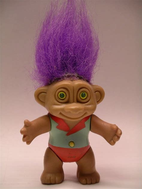 A troll doll - popular in the late 60s and early 70s with hair in all different colors - OMG ...