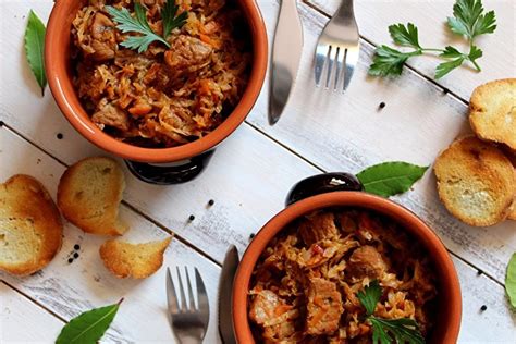 Homemade bigos with plum wine