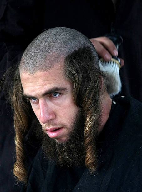 An Ultra orthodox Jew has a hair cut bef Pictures | Getty Images