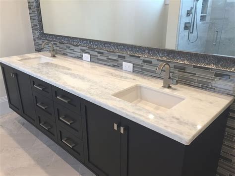 White Granite Double Vanity Sink With Modern Black Cabinets and Large Mirror | Granite bathroom ...