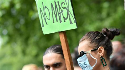 London face mask protests: Hundreds of people, some wearing masks ...