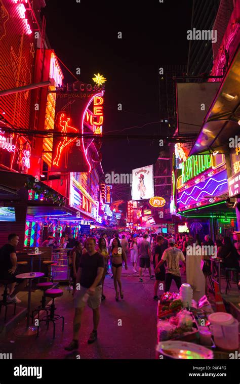 Sukhumvit - the Bangkok neon light district with night clubs, bars and sex shows Stock Photo - Alamy