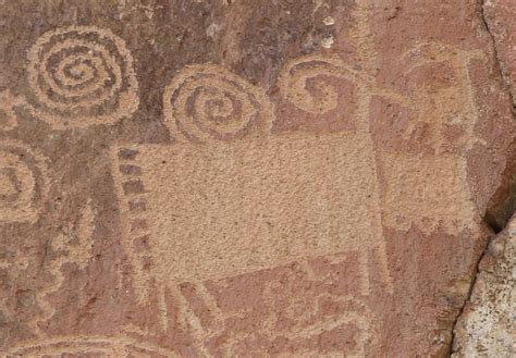 Stylized bighorn sheep and spirals petroglyphs. Fremont Indian State Park and Museum, Utah ...