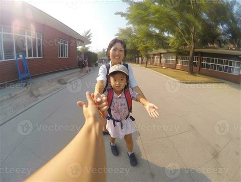 AI Generative first day at school mother leads a little child school ...