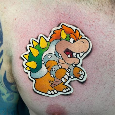 Bowser sticker tattoo on the chest.