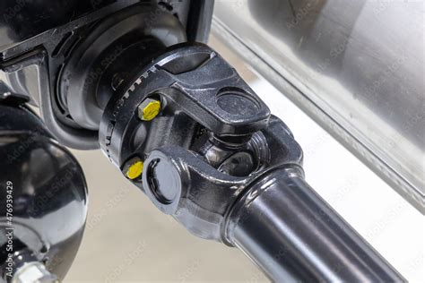 Closeup of a car cardan drive shaft with cardan cross joint and ...