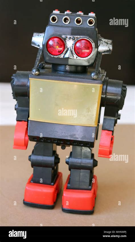 Retro Toy Walking Plastic Robot - Grey Body (1/2 Stock Photo - Alamy