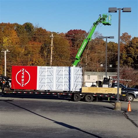 Girard Nissan - Our brand-new signage arrived and is being...