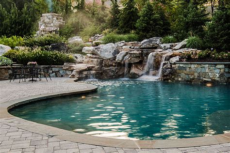 How Backyard Waterfalls Bring Balance to a Landscape Design