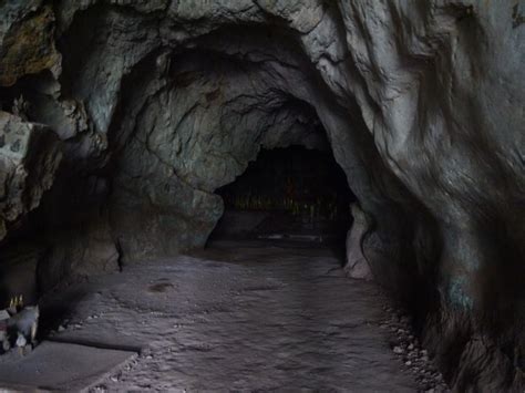 Exploring the Top Cave at Pak Ou Caves in Laos