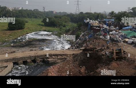 Polluted Musi river next to Slums Stock Video Footage - Alamy