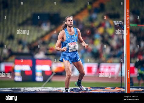 Gianmarco Tamberi participating in the high jump at the 2022 European ...