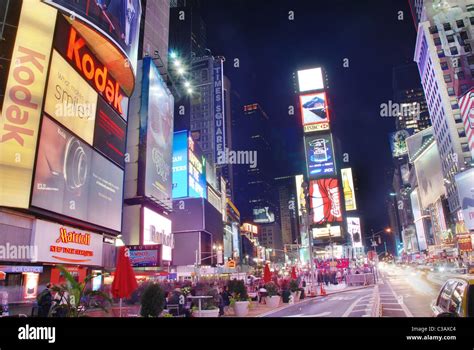 Times Square at night street view with busy traffic in Manhattan, New ...