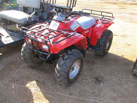 HONDA FOURTRAX 300 ATV - J.M. Wood Auction Company, Inc.