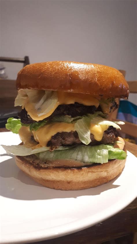 Smashburger’s version of a Big Mac double cheeseburger | Smash burger, Best burger recipe ...