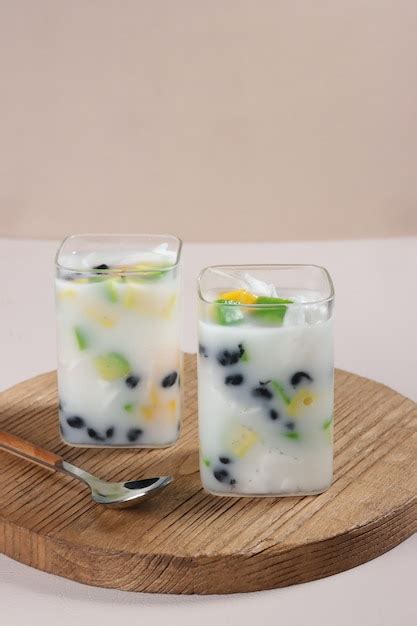 Premium Photo | Es buah or sop buah is mixed fruit and jelly with coconut water served with ...