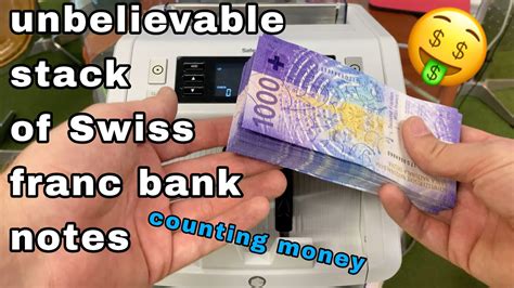 unbelievable stack of swiss 1000 CHF franc bank notes counting by money machine - YouTube