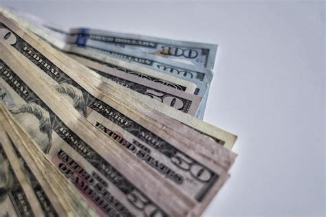 A pile of American dollar bills 2029101 Stock Photo at Vecteezy