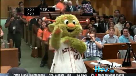 Houston Astros mascot, Orbit, visits city hall and tosses T-shirts at ...