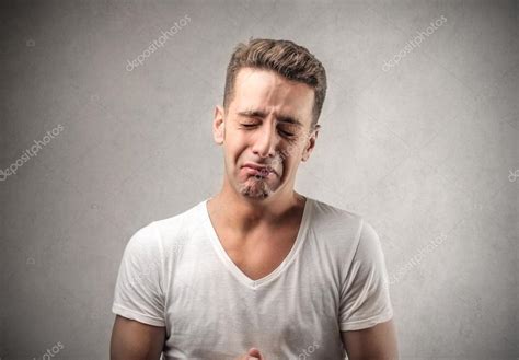 Sad young man crying Stock Photo by ©olly18 34439227