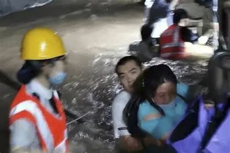 12 die in flooded subway car during historic rains in China