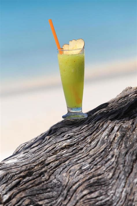 fruit cocktail on a tropical island beach 10382208 Stock Photo at Vecteezy