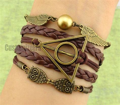 What.... | Harry potter bracelet, Winged bracelet, Harry potter obsession