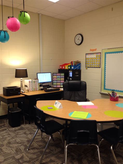 Teachers desk with kidney table. Dry erase circles for kids to practice during small group ...