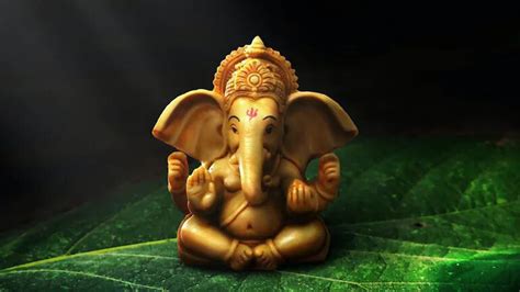 Gold Color Ganesh On Green Leaf HD Ganesh Wallpapers | HD Wallpapers ...