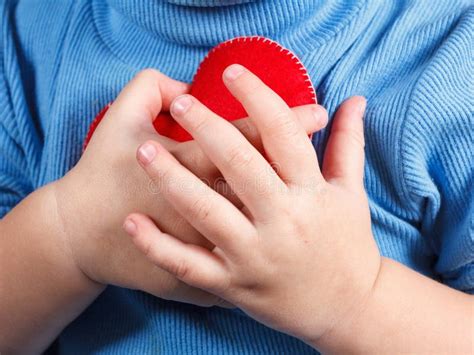 Hands Holding Baby Heart Symbol. Concept Of Love, Health And Care Stock Photo - Image: 66374972