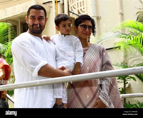 Bollywood actor Aamir Khan Kiran Rao their son Azad Rao Khan arrive to meet the media while ...