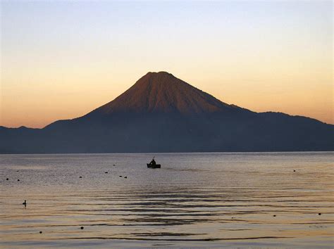 Sunrise over Lake Atitlan Photograph by Kurt Van Wagner - Fine Art America